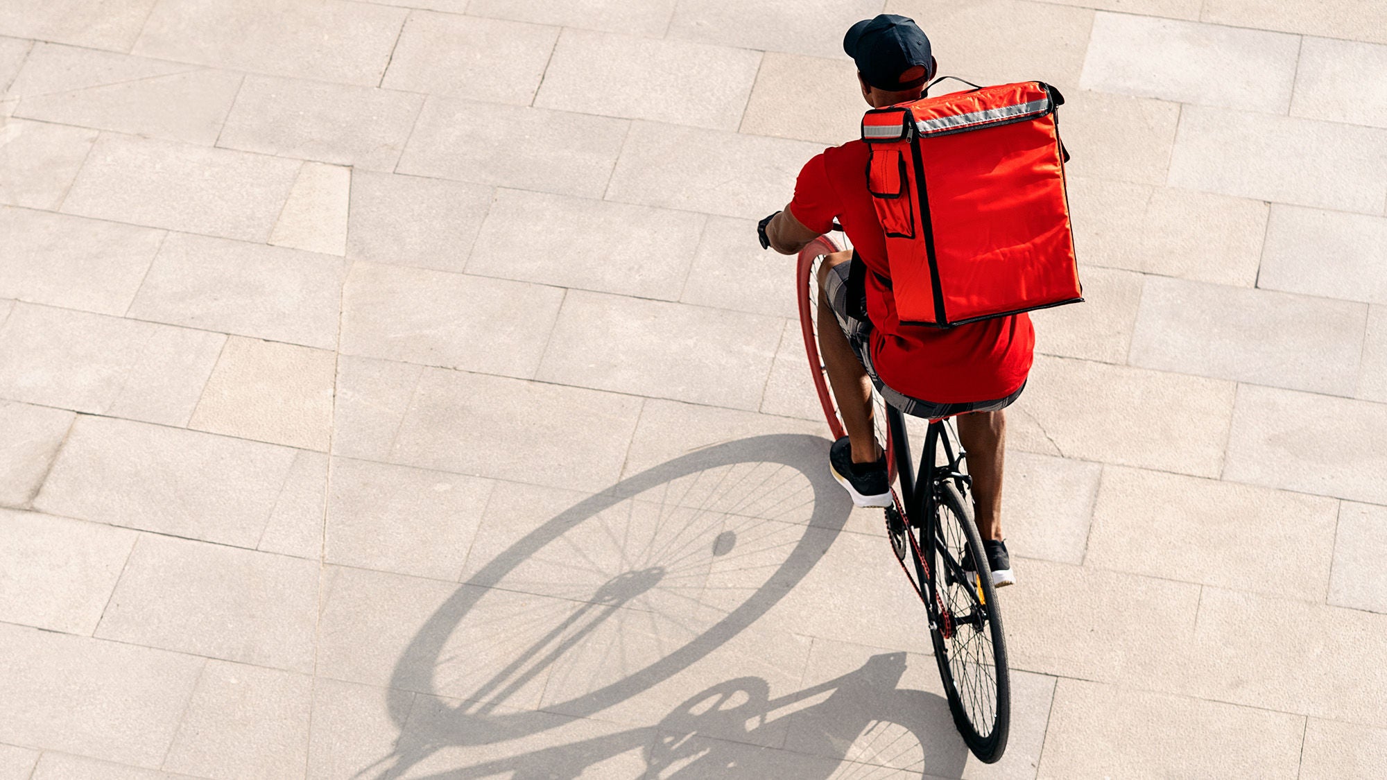 Delivery Man Riding Bike