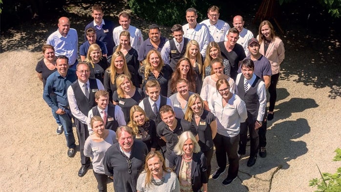 Teamfoto in Herzform